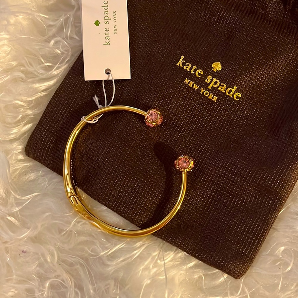 Kay Spade bangle NWT. Gold with pink rosé quartz crystals.